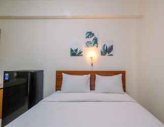 Bedroom 2 Comfy Studio near The Jungle Waterpark at Bogorienze Apartment By Travelio