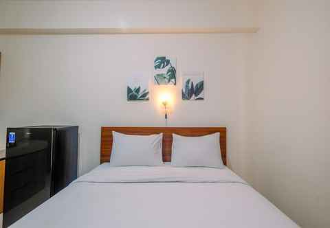 Bedroom Comfy Studio near The Jungle Waterpark at Bogorienze Apartment By Travelio