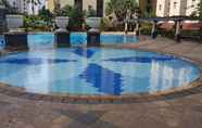 Swimming Pool 5 Comfy & Cozy 2BR High Floor Apartment at Mediterania Palace Residences By Travelio