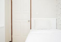 Bedroom 2 Comfy & Cozy 2BR High Floor Apartment at Mediterania Palace Residences By Travelio