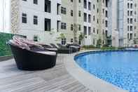 Kolam Renang Homey 2BR at Vittoria Residence Apartment By Travelio