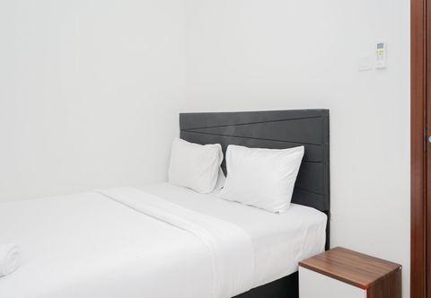 Bedroom Comfort 2BR at Vittoria Residence Apartment By Travelio