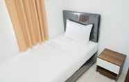 Bedroom 2 Comfort 2BR at Vittoria Residence Apartment By Travelio