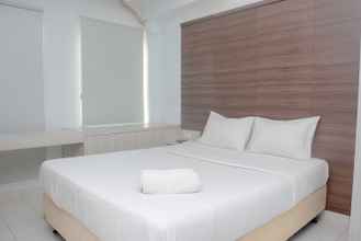 Kamar Tidur 4 Comfy Studio Apartment at Patraland Urbano By Travelio