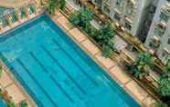 Kolam Renang 7 Homey and Nice 2BR City Park Apartment By Travelio