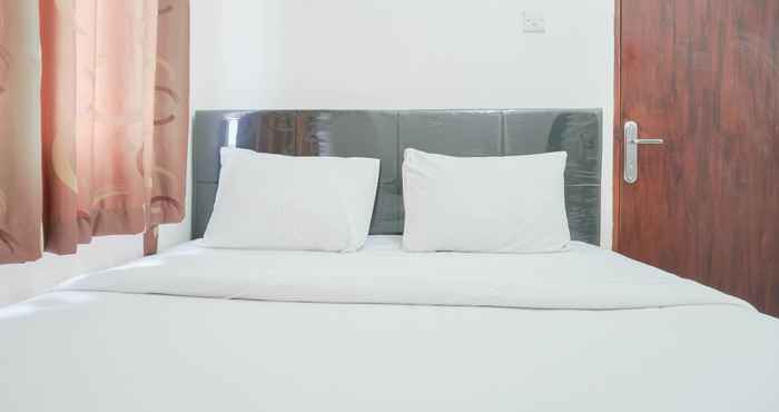 Kamar Tidur Homey and Nice 2BR City Park Apartment By Travelio