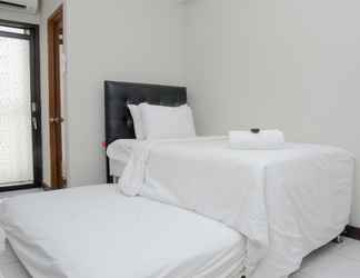 Bedroom 2 Alluring Studio near Bekasi Town Square at Lagoon Apartment By Travelio