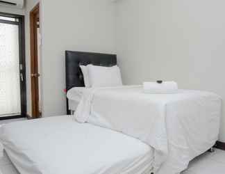 Kamar Tidur 2 Alluring Studio near Bekasi Town Square at Lagoon Apartment By Travelio