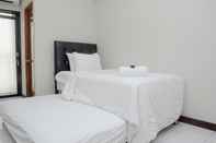 Kamar Tidur Alluring Studio near Bekasi Town Square at Lagoon Apartment By Travelio