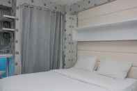 Bedroom Comfort with City View Studio Apartment at Tifolia By Travelio