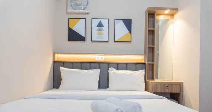Bedroom Splendid 2BR Apartment at Bassura City By Travelio