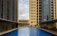 Swimming Pool 7 Exquisite 2BR Apartment at Branz BSD By Travelio