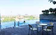 Swimming Pool 6 Cozy Elegant Studio Room Apartment at Tamansari Papilio By Travelio