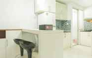 Common Space 4 Homey and Spacious 2BR Green Central City Apartment By Travelio