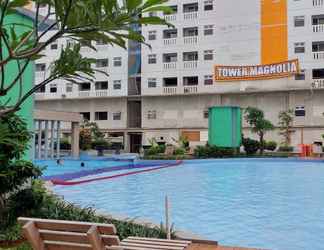 Bangunan 2 Comfortable 2BR Apartment Direct Access to Mall at Green Pramuka City By Travelio