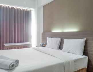 Bedroom 2 Comfy & Best Price Studio Apartment Taman Melati Surabaya By Travelio