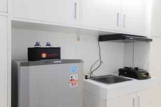 Common Space 4 Clean and Modern Studio Apartment at M-Town Residences By Travelio