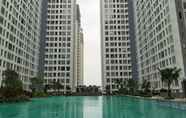 Swimming Pool 4 Clean and Modern Studio Apartment at M-Town Residences By Travelio