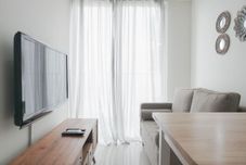 公共空間 Simply and Comfort 1BR at Sedayu City Suites Apartment By Travelio