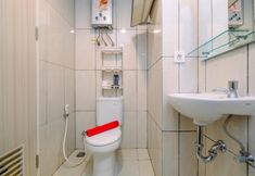 In-room Bathroom 4 Simply and Comfy Studio Room at Grand Kamala Lagoon Apartment By Travelio