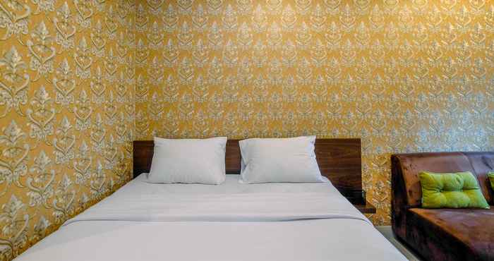 Bilik Tidur Simply and Comfy Studio Room at Grand Kamala Lagoon Apartment By Travelio