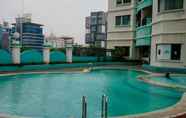 Swimming Pool 5 Minimalist and Comfort Studio Puri Kemayoran Apartment By Travelio