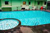 Swimming Pool Strategic and Comfy 2BR at Menteng Square Apartment By Travelio