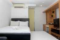 Bedroom Fully Furnished with Cozy Design Studio Apartment at Bassura City By Travelio