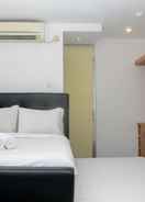 BEDROOM Fully Furnished with Cozy Design Studio Apartment at Bassura City By Travelio