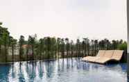 Swimming Pool 5 Cozy Living 1BR at Bintaro Plaza Residence Apartment By Travelio