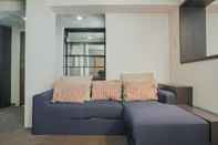 Lobby Cozy 2BR Apartment near Shopping Mall at Great Western Resort By Travelio