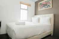 Bedroom Cozy 2BR Apartment near Shopping Mall at Great Western Resort By Travelio