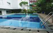 Swimming Pool 4 Spacious and Comfort Studio Room Bassura City Apartment By Travelio