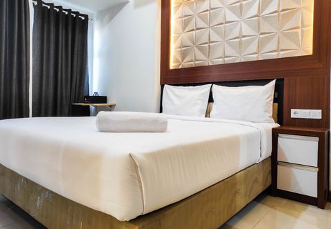 寝室 Comfy and Homey Studio at Vida View Makassar Apartment By Travelio