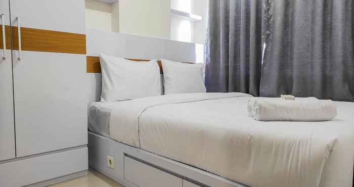 Bedroom Comfy and Homey 2BR at Vida View Apartment By Travelio