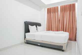 Bedroom 4 Comfy 1BR Apartment at Sedayu City Suites By Travelio