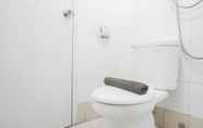 In-room Bathroom 6 Elegant 2BR Apartment at Bassura City By Travelio