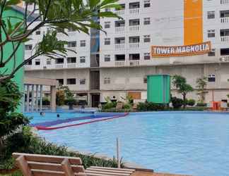 Bangunan 2 Cozy Stay near Shopping Center at 2BR Green Pramuka Apartment By Travelio