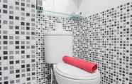 In-room Bathroom 6 Cozy Stay near Shopping Center at 2BR Green Pramuka Apartment By Travelio