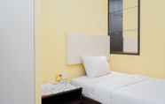 Bedroom 2 Spacey 2BR at Great Western Resort Apartment By Travelio