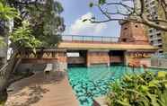 Swimming Pool 7 Spacey 2BR at Great Western Resort Apartment By Travelio