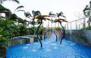 Swimming Pool 7 Scenic Studio Apartment at West Vista Puri By Travelio