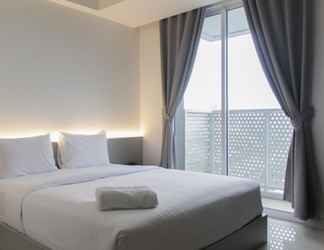 Bedroom 2 Scenic Studio Apartment at West Vista Puri By Travelio