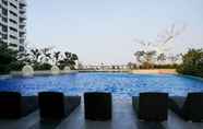 Swimming Pool 5 Scenic Studio Apartment at West Vista Puri By Travelio