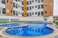Swimming Pool Artistic Studio at Urban Heights Residences Apartment BSD City By Travelio
