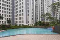 Exterior Comfort Studio Apartment M-Town Residence with Garden View By Travelio