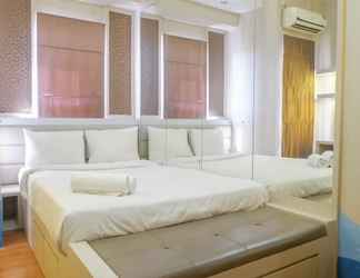 Kamar Tidur 2 Tidy and Trendy Studio at Puri Mas Apartment By Travelio