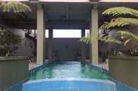 Lobi Comfy 3BR Apartment at Grand Asia Afrika Bandung By Travelio