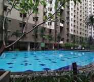 Swimming Pool 7 Simply and Cozy 3BR Apartment at Gateway Ahmad Yani Cicadas By Travelio