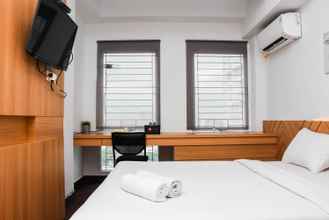 Kamar Tidur 4 Pleasant Studio near Station at Patraland Urbano Apartment By Travelio